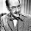 Groucho Marx with a cigar in his mouth and a bow tie